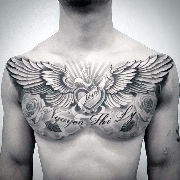 tatuaggio ali sul petto 49